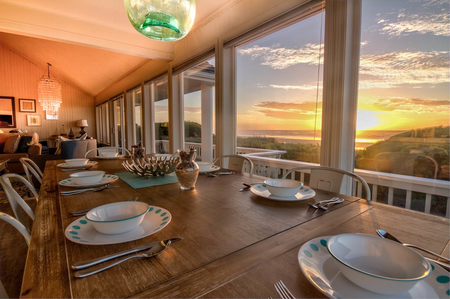 Oceanfront view of Alicia by the Sea in Waldport, Oregon, featuring a sunny deck and private beach access.