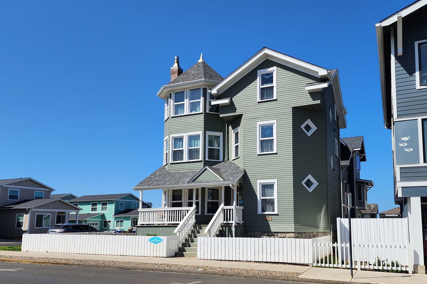 Beautiful green three story house