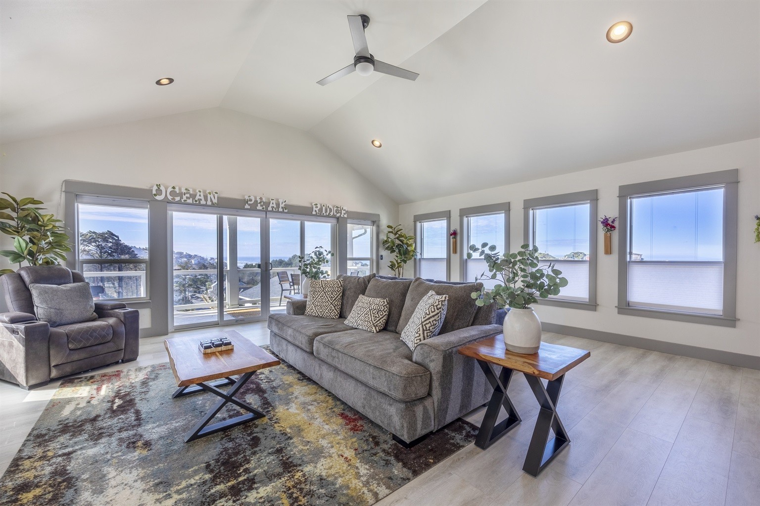 Ocean view vacation home in Lincoln City Oregon with multiple decks, modern coastal interior, private hot tub, and spacious living area overlooking the Pacific Ocean.